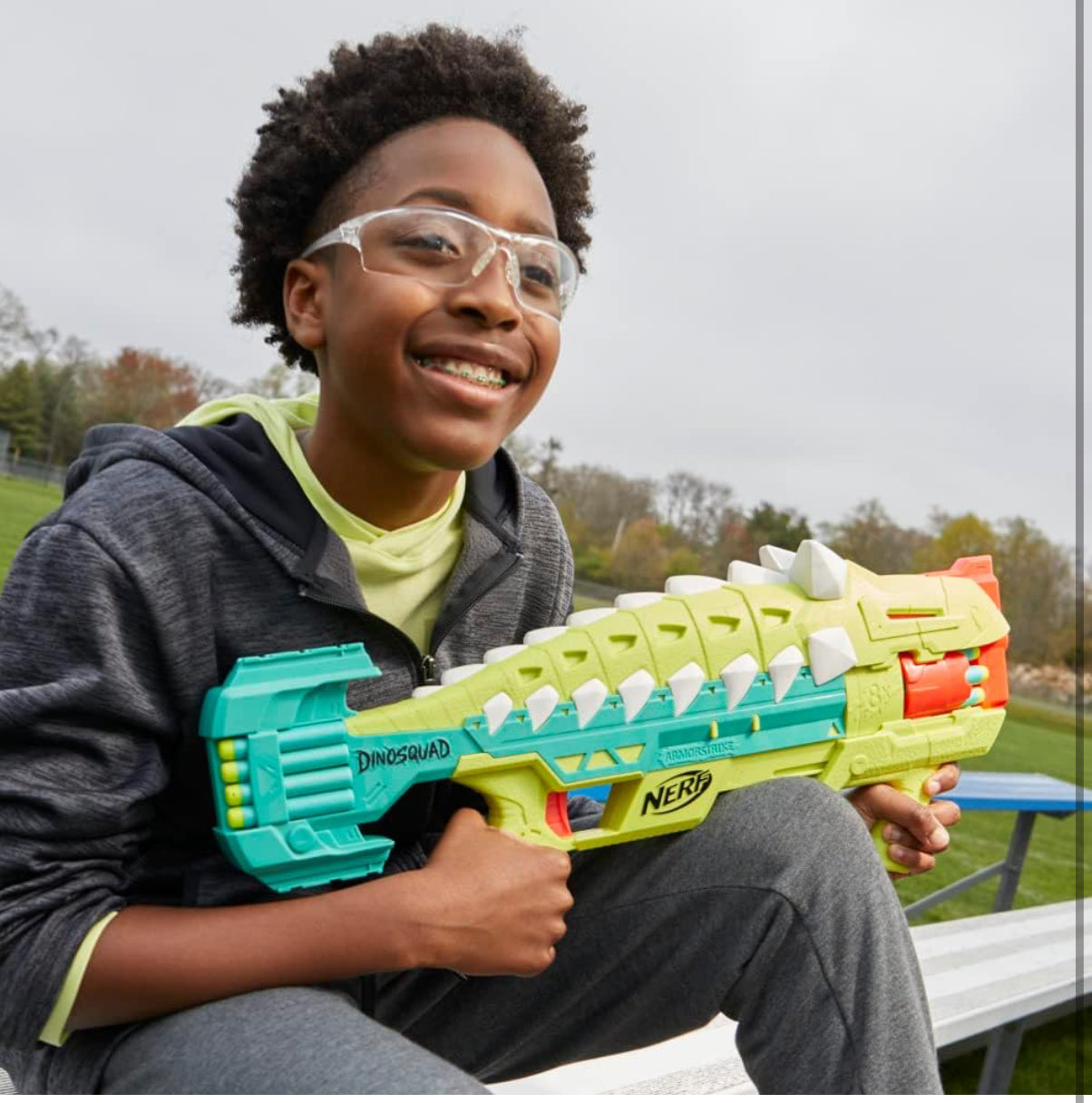 Nerf DinoSquad Armorstrike Dart Blaster, 8-Dart Rotating Drum, Drop Grip, 16 Nerf Elite Darts, Anklyosaurus Dinosaur Design
